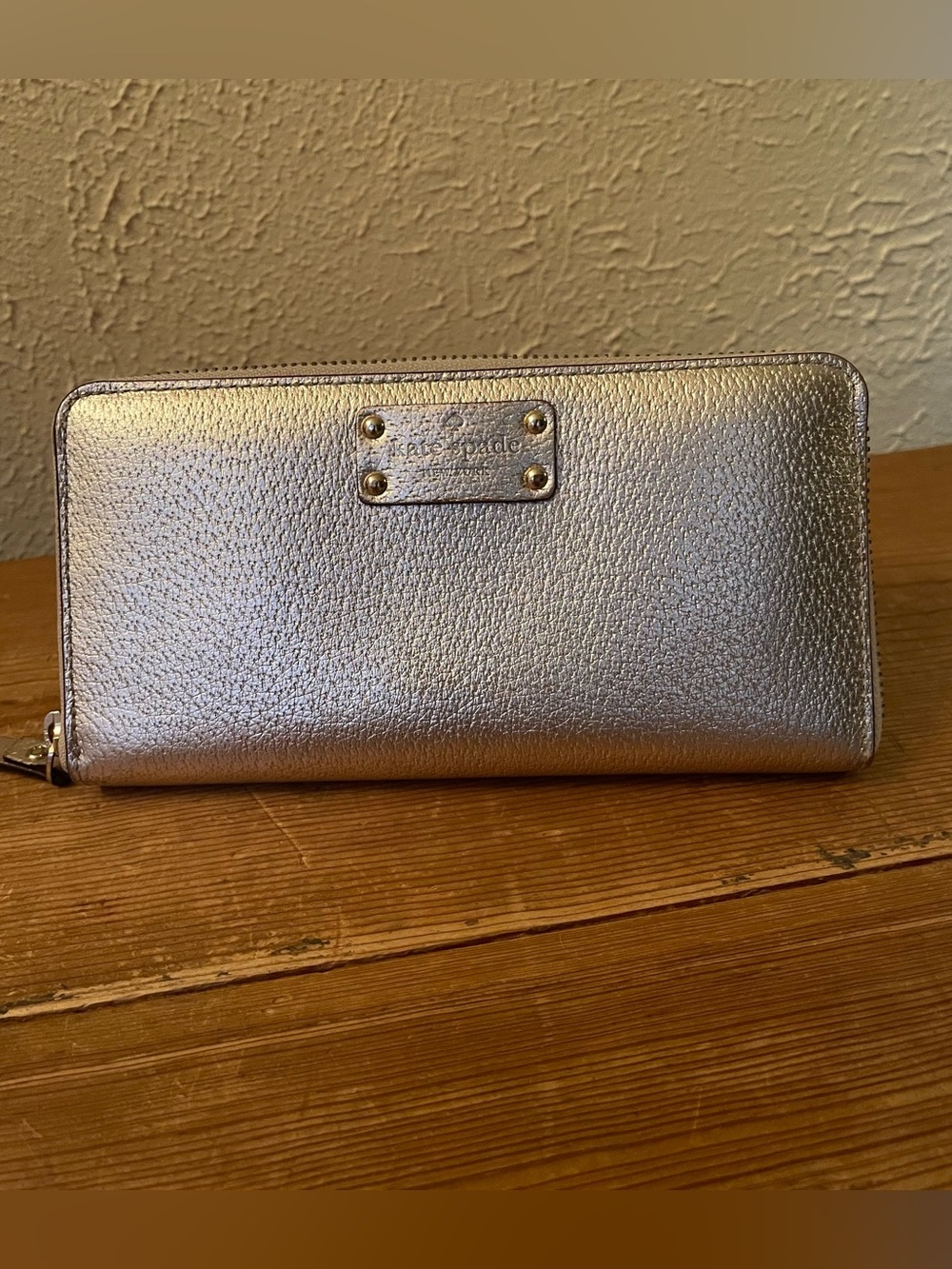 Hard-to-find discontinued Kate Spade metallic champagne/rose gold wallet